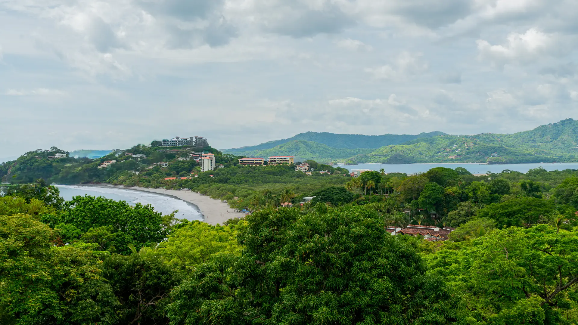 Hillside view over a Guanacaste beach town and the bay
